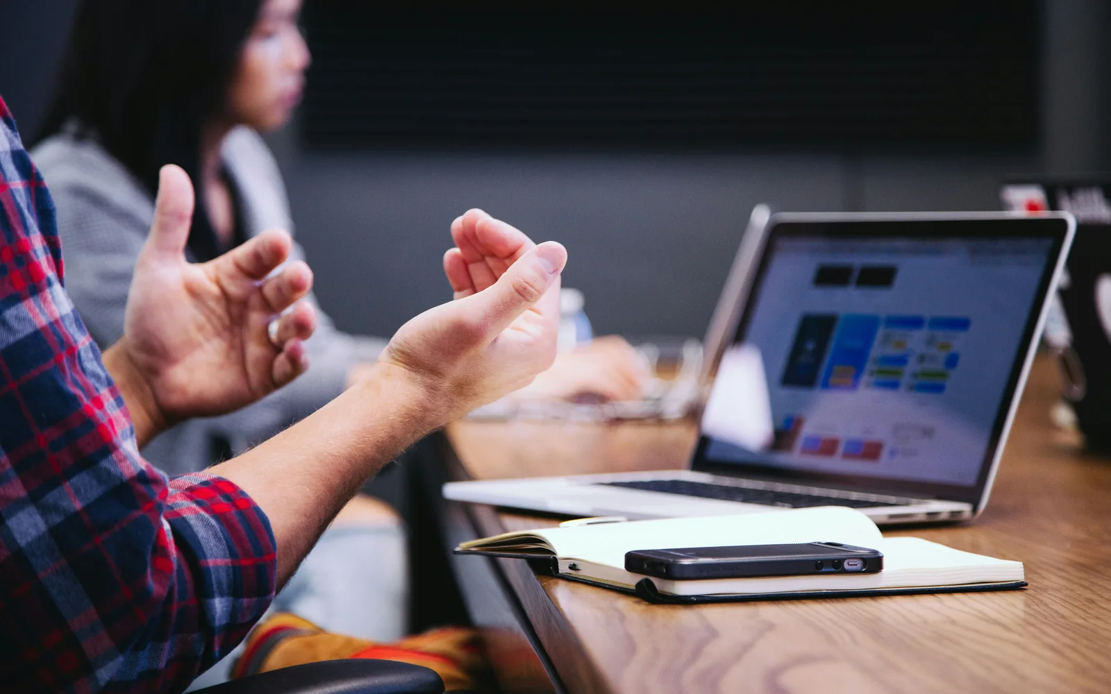 Professionals in a focused meeting and discussion